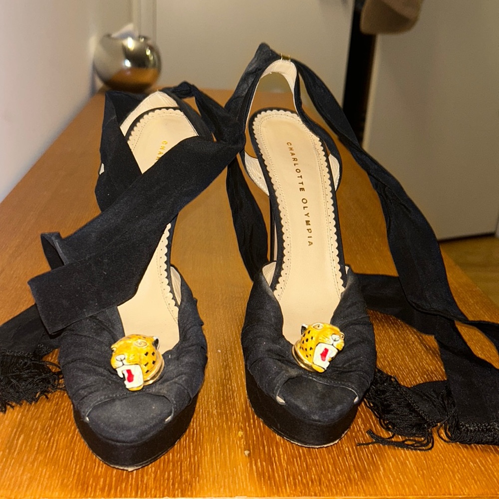 Gently worn Charlotte Olympia heels bought in Europe were not available in USA